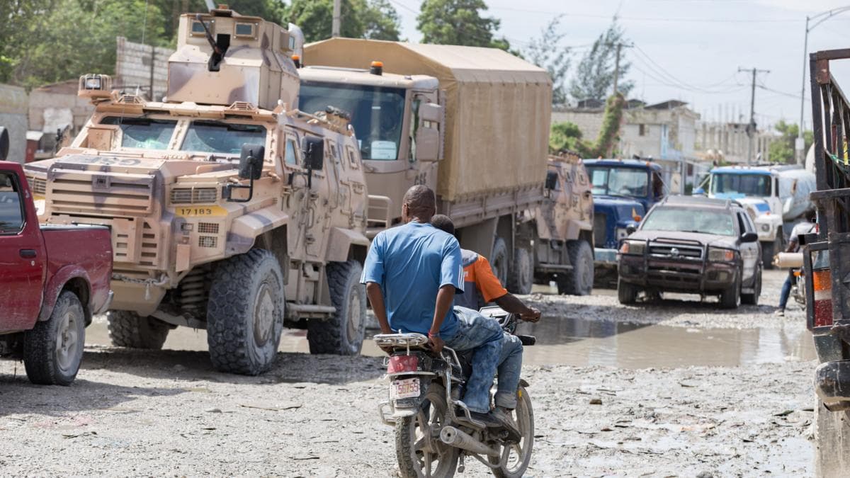 Gang Suppression Force (GSF) vehicles are seen in a traffic jam in downtown Port-au-Prince, Haiti, on October 24, 2026. Approximately 450 Salvadoran soldiers have arrived in the Haitian capital to reinforce the GSF and take part in search…