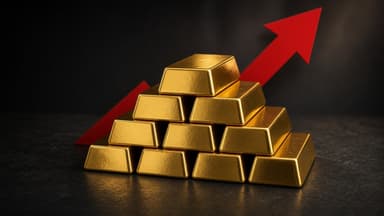 Stacked gold bars with a red arrow rising