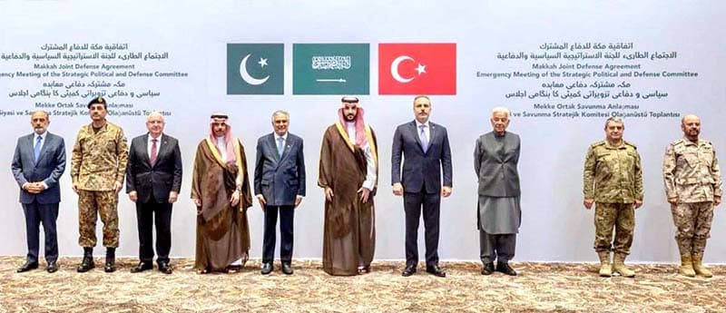 FILE – 6 October 2026: Deputy Prime Minister/Foreign Minister Senator Mohammad Ishaq Dar, Defence Minister Khawaja Muhammad Asif and Chief of Army Staff Field Marshal Syed Asim Munir in a group photo of the Emergency Meeting of the…
