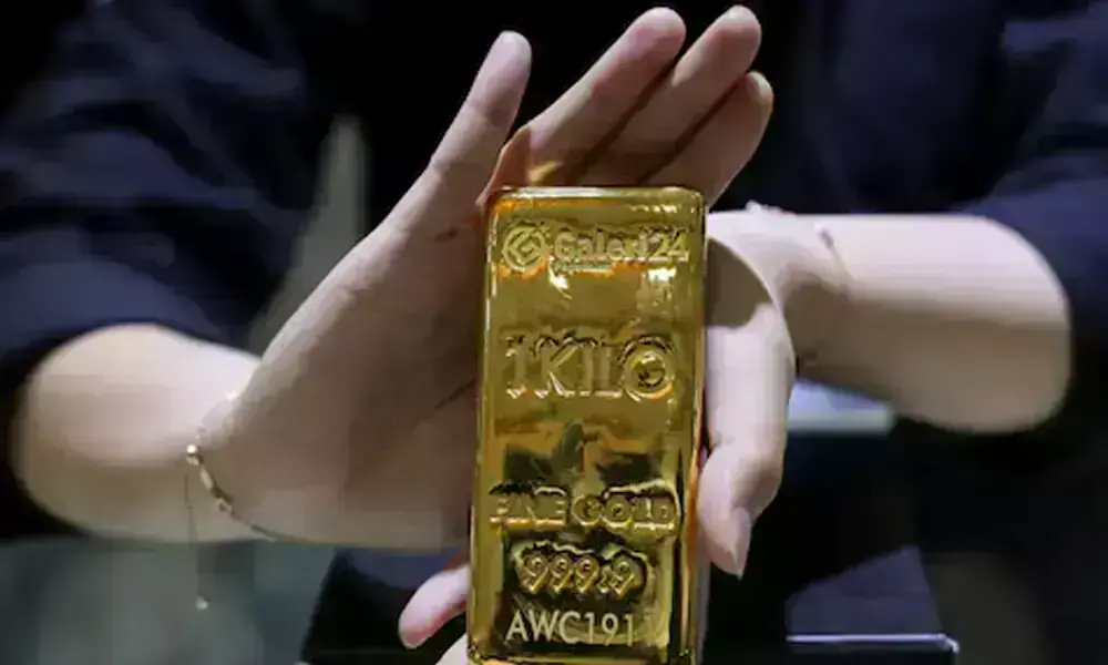 Gold prices fall as oil surges amid Strait of Hormuz tensions Gold prices fall as oil surges amid Strait of Hormuz tensions