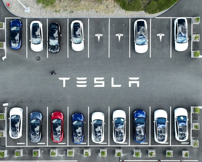 Tesla profits decline as stock falls