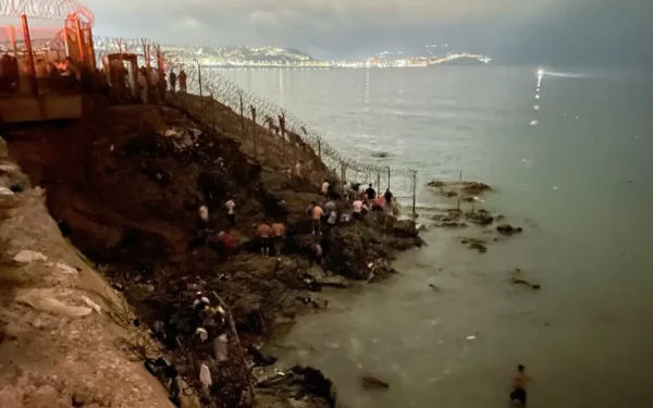 Migrants storm Moroccan town near Ceuta, torch vehicles