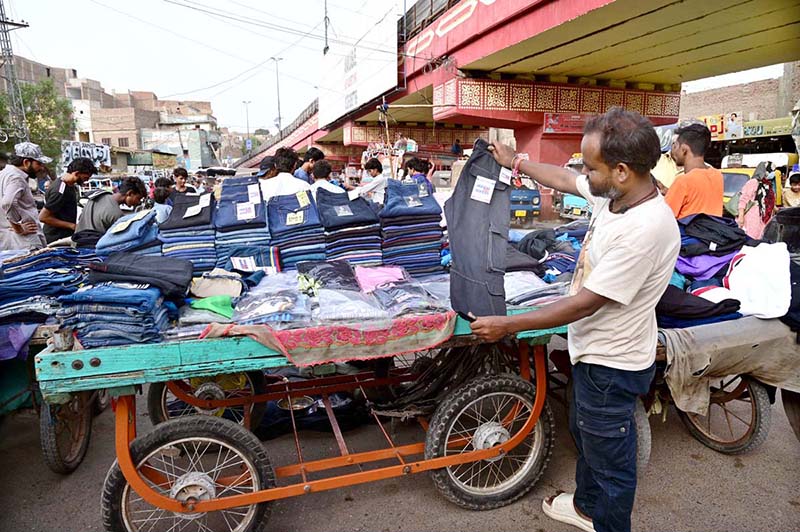 Street vendors showcase diverse products in busy markets Street vendors showcase diverse products in busy markets
