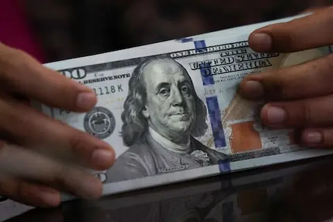 Dollar weakens as softer inflation data curbs Fed hike bets