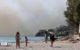 Thousands evacuated from Crete as wildfires spread