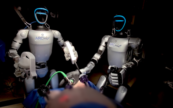 Surgeons Control Humanoid Robots to Perform First Live Animal Surgery