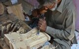 Elderly carpenter carves intricate designs in federal capital