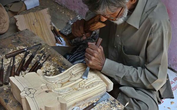 Elderly carpenter carves intricate designs in federal capital Elderly carpenter carves intricate designs in federal capital
