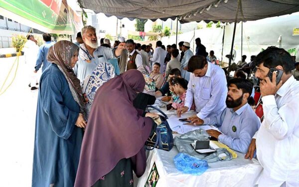 Voters Receive Voting Numbers from Polling Camps in AJK