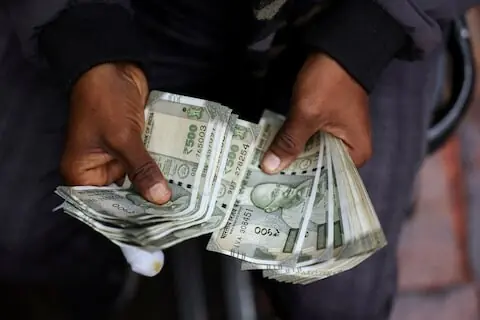 Indian rupee to open steady amid oil, Fed pressures