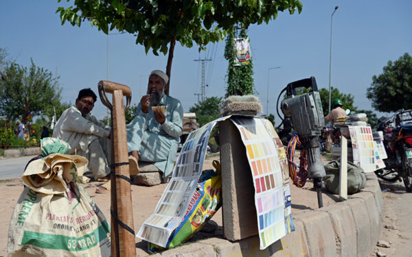 Daily-wage labourers wait for work in Federal Capital
