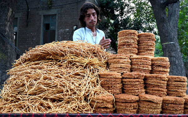 Street vendors busy arranging snacks for customers