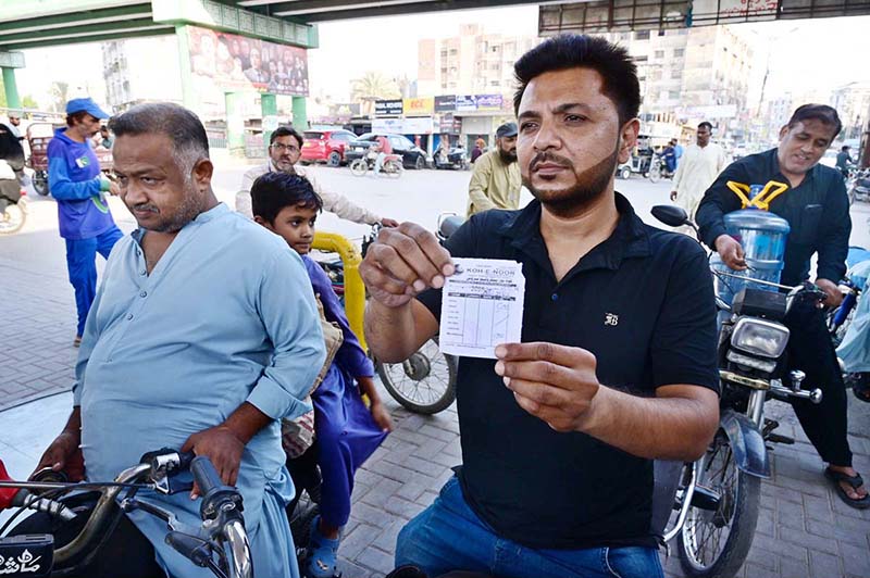 Motorcyclist receives subsidized petrol under PM’s relief scheme