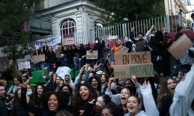 Tens of thousands rally in Paris for high school student protests Tens of thousands rally in Paris for high school student protests
